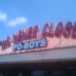 We Never Close Po-Boys Sign